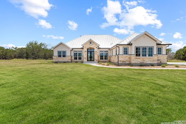 craftsman-style house with a front yard