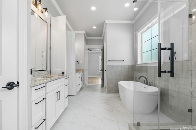 bathroom featuring crown molding, vanity, tile walls, tile patterned floors, and plus walk in shower