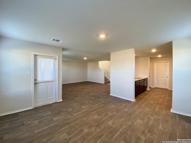 interior space with dark hardwood / wood-style flooring