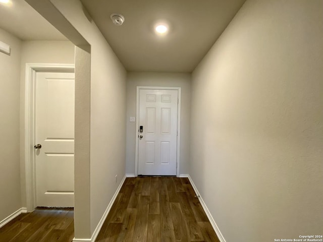 doorway to outside featuring dark hardwood / wood-style flooring