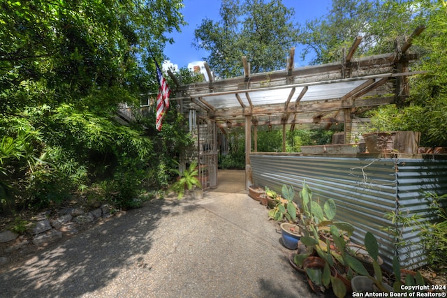 exterior space with a pergola