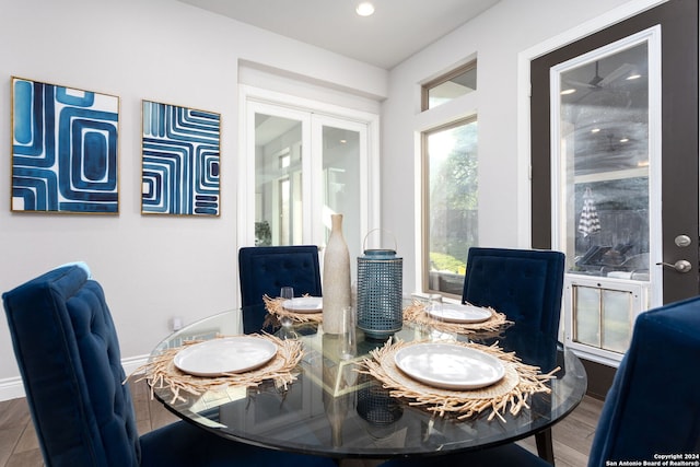 dining area featuring hardwood / wood-style flooring