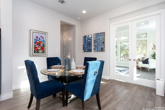 dining space featuring french doors