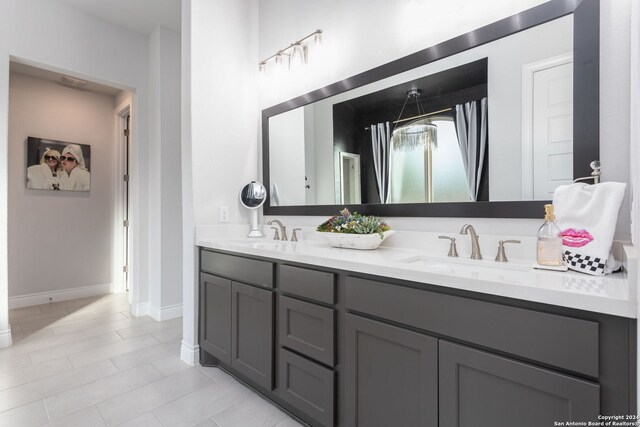 bathroom featuring tile patterned floors and vanity