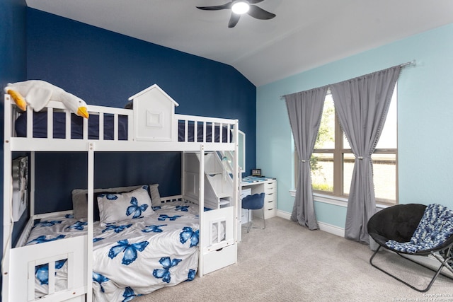 bedroom with carpet flooring, ceiling fan, and lofted ceiling