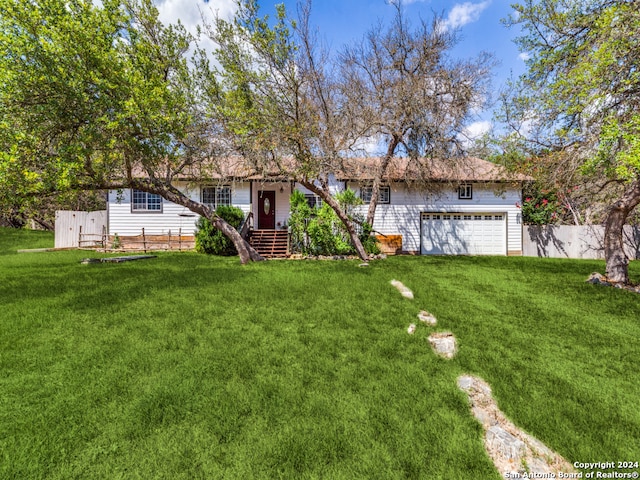 view of yard featuring a garage