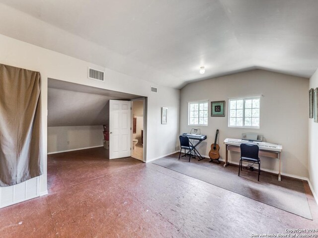 office space featuring vaulted ceiling