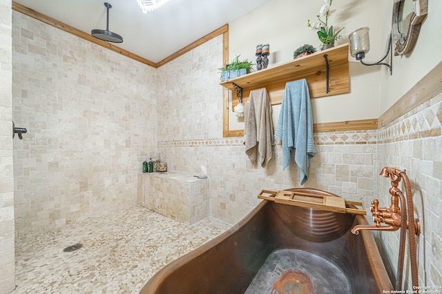 bathroom featuring walk in shower and tile walls