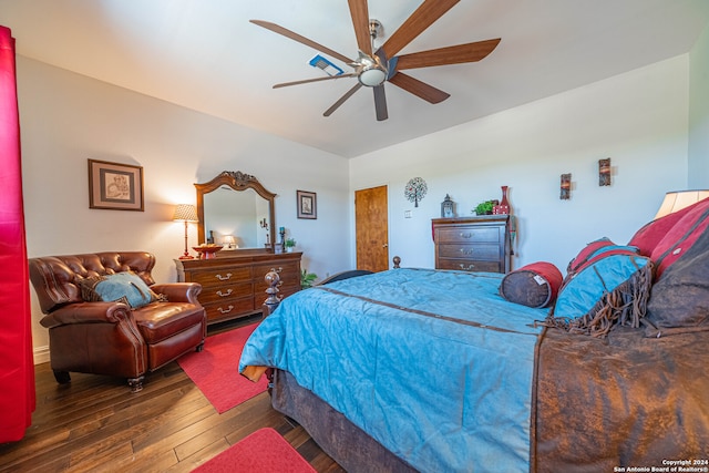 bedroom with hardwood / wood-style flooring and ceiling fan