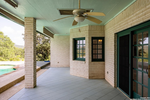 view of patio featuring a wooden deck and ceiling fan