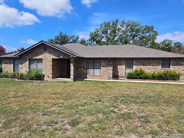 ranch-style house with a front yard