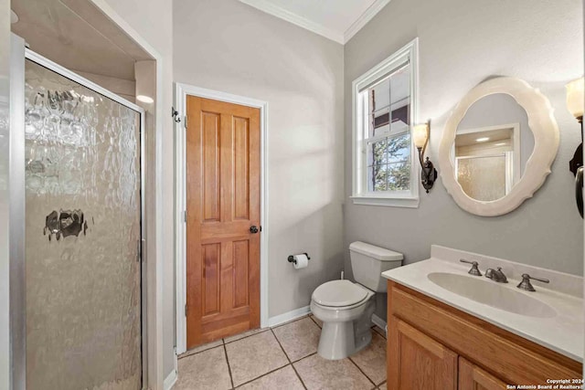 bathroom with a shower with door, toilet, vanity, tile patterned floors, and ornamental molding