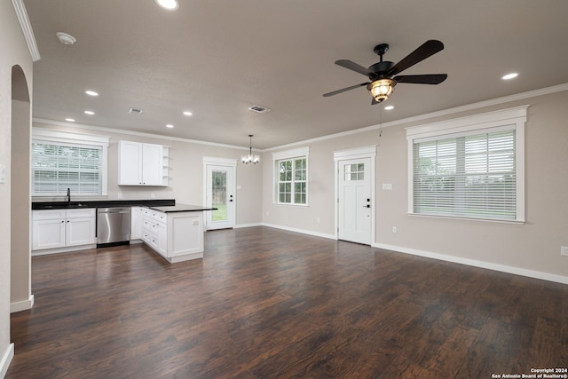 kitchen featuring pendant lighting, dishwasher, dark wood-type flooring, sink, and white cabinetry