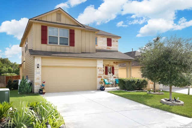 view of front of property with a garage and a front lawn