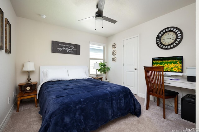 bedroom featuring ceiling fan and carpet floors