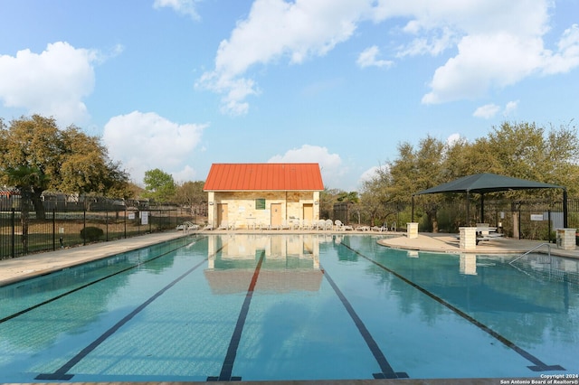 view of pool featuring a patio