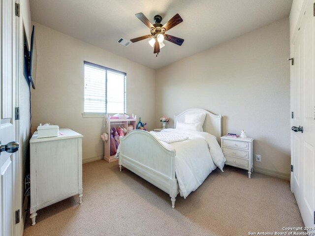 unfurnished bedroom featuring carpet flooring, vaulted ceiling, and multiple windows