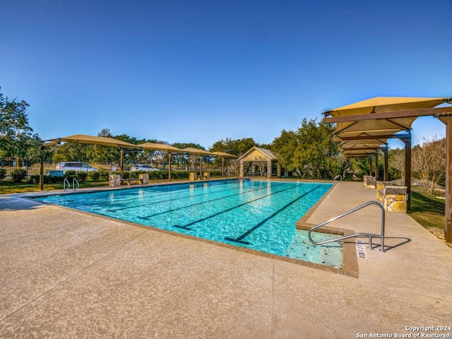 pool featuring a patio area