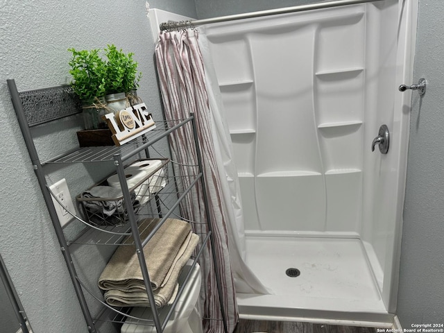 bathroom with a shower with curtain