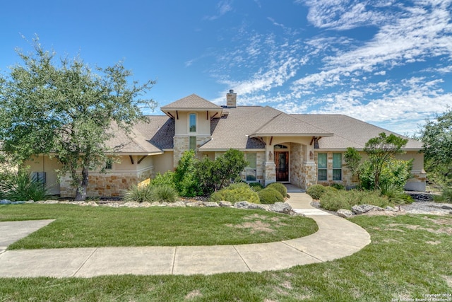 view of front of home with a front lawn