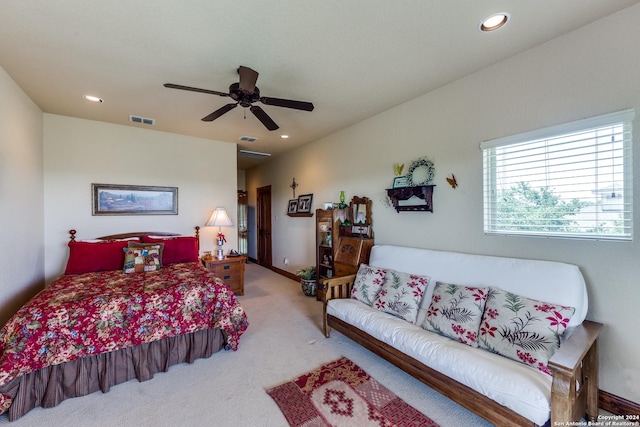 carpeted bedroom with ceiling fan