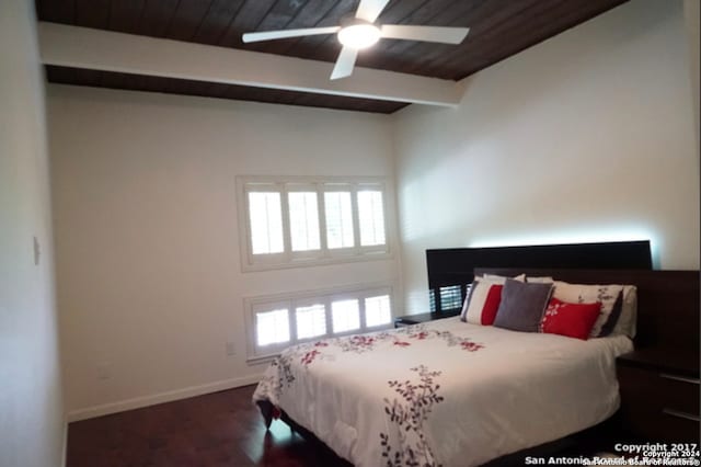 bedroom featuring dark wood-type flooring, wood ceiling, and ceiling fan