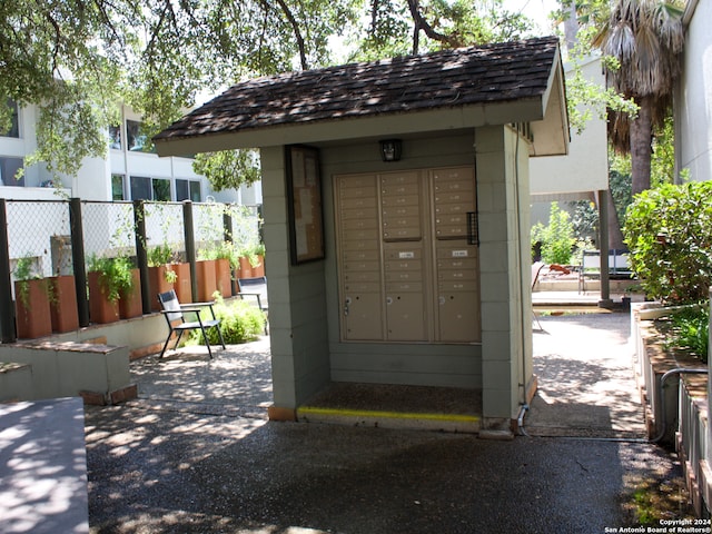 view of property's community with a mail area