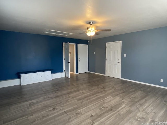 spare room featuring hardwood / wood-style flooring and ceiling fan