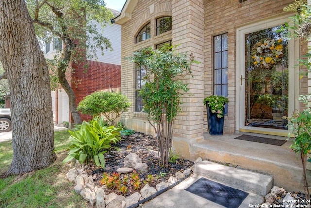 property entrance with a garage