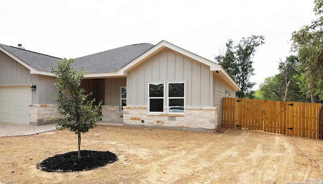 view of front of home with a garage