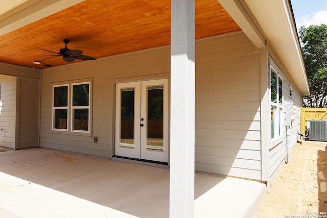 view of patio / terrace with ceiling fan, french doors, and central AC unit