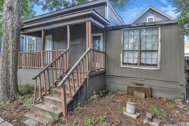 entrance to property with a porch