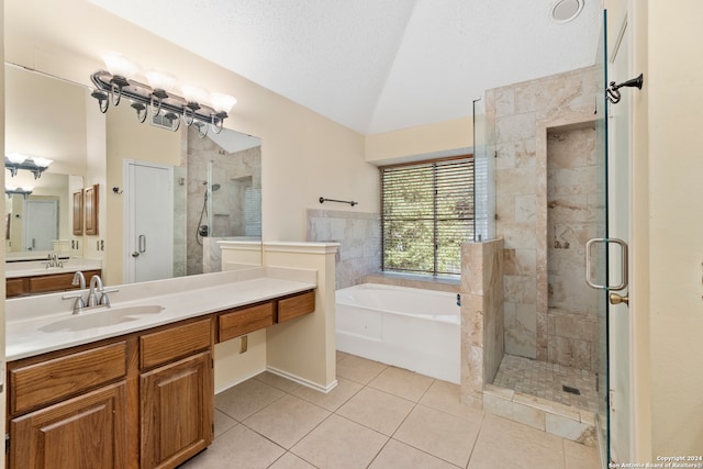 bathroom with lofted ceiling, tile patterned flooring, vanity, plus walk in shower, and a textured ceiling