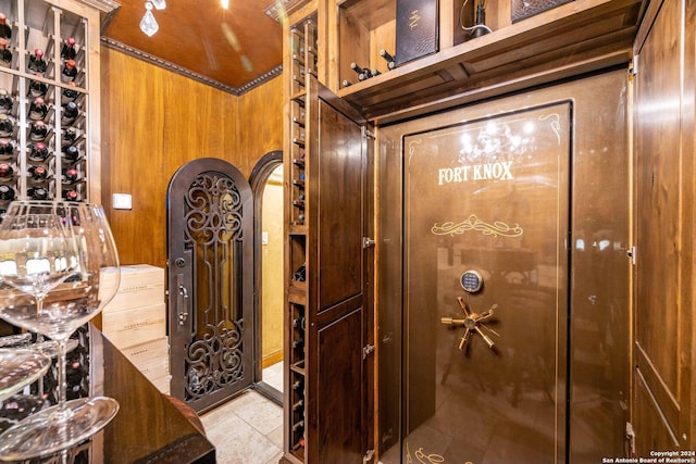 wine room with wood walls