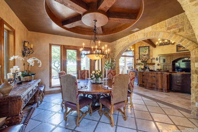 dining area featuring coffered ceiling, a notable chandelier, and beam ceiling