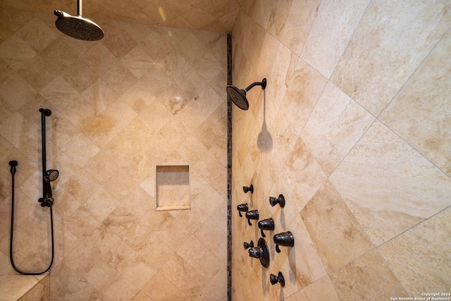 room details featuring a tile shower