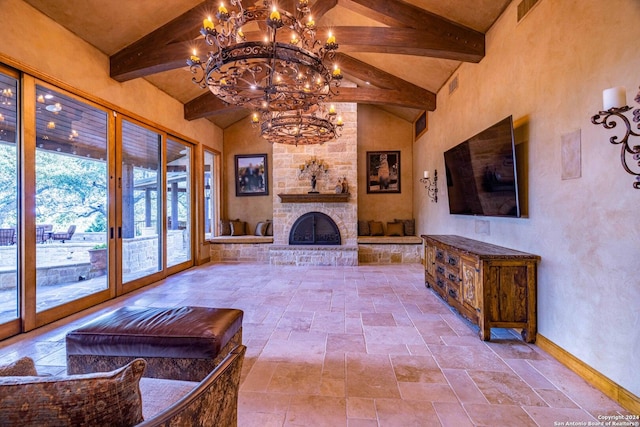 unfurnished living room featuring french doors, a stone fireplace, an inviting chandelier, high vaulted ceiling, and beam ceiling