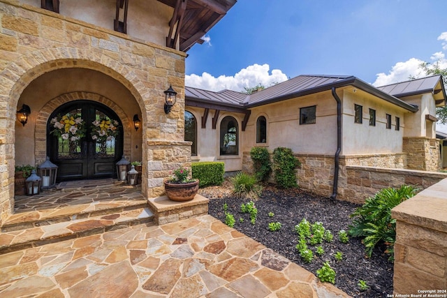 doorway to property with french doors