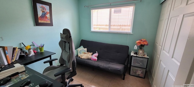 home office with tile patterned flooring