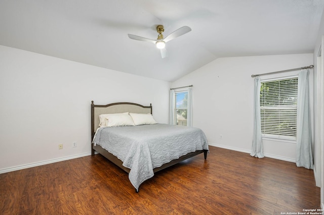 bedroom featuring ceiling fan, lofted ceiling, and dark hardwood / wood-style flooring