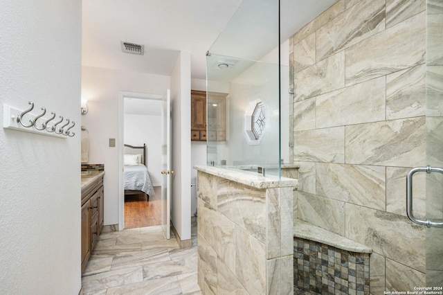 bathroom featuring vanity and walk in shower