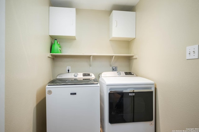 laundry room featuring separate washer and dryer