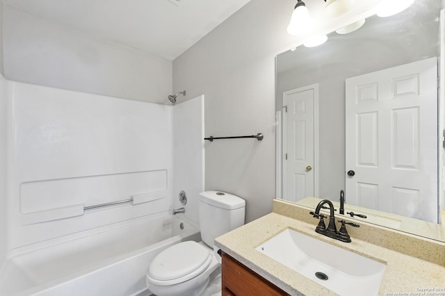 full bathroom with vanity, shower / bathtub combination, and toilet