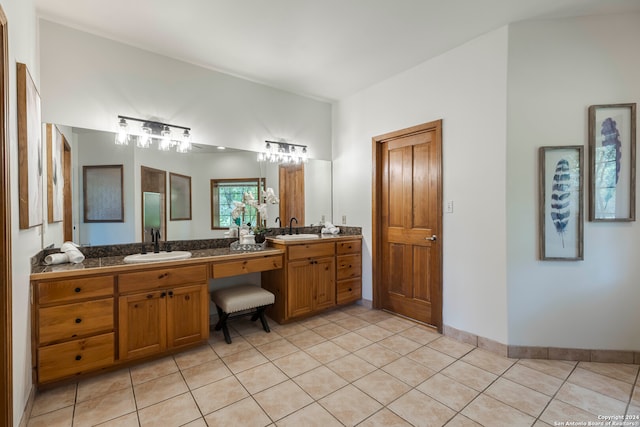 bathroom with dual vanity and tile patterned floors