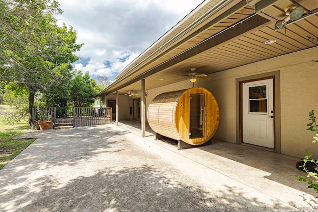 view of patio featuring ceiling fan