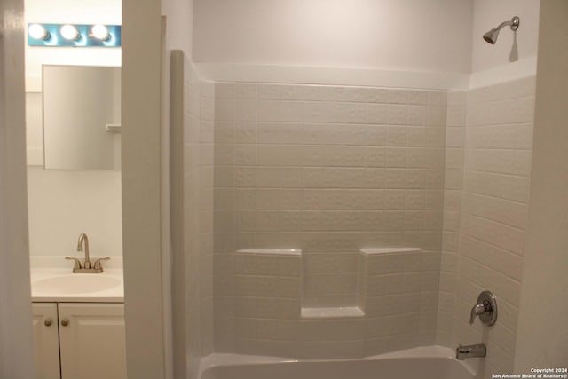 bathroom featuring vanity and washtub / shower combination