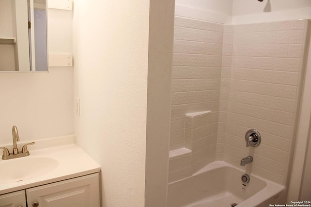 bathroom featuring vanity and shower / bath combination