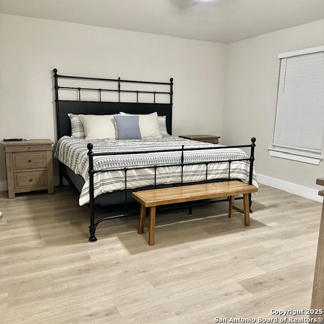 bedroom featuring light hardwood / wood-style flooring