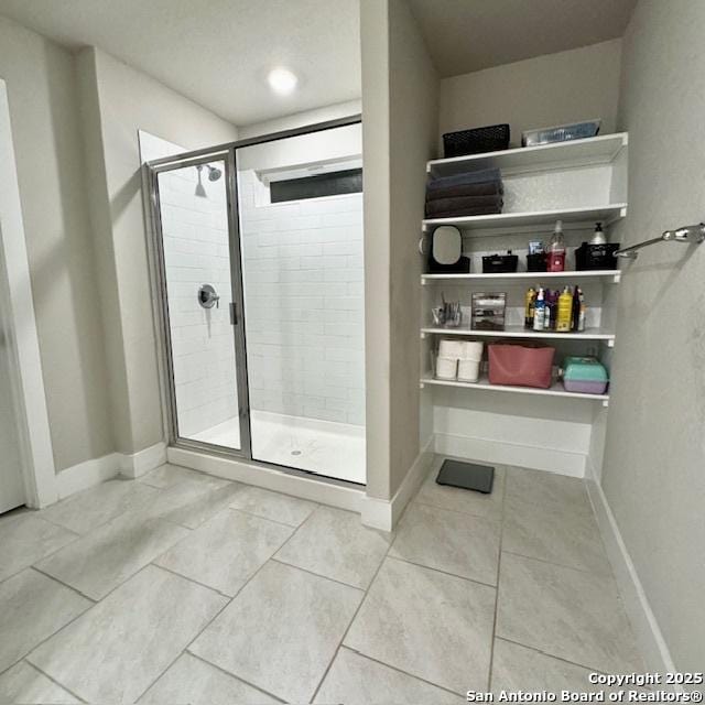 bathroom featuring an enclosed shower