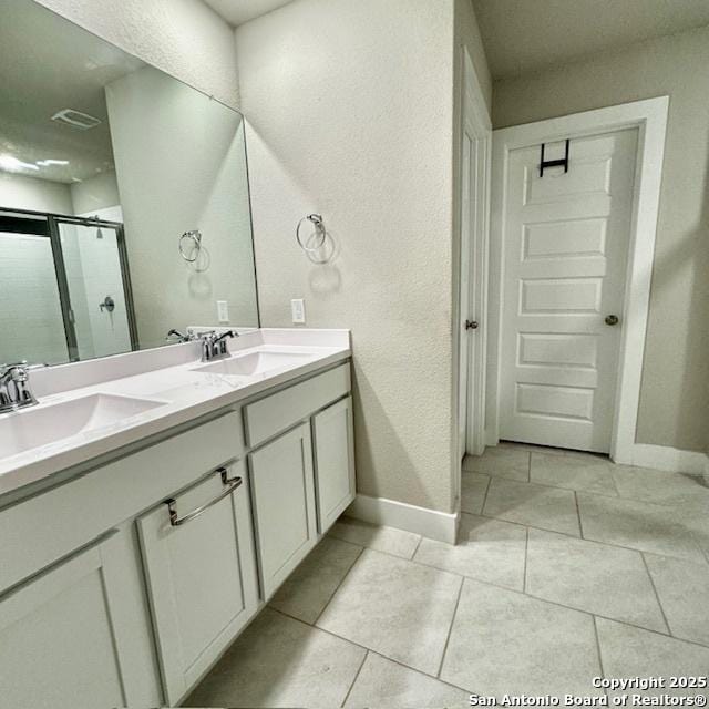 bathroom featuring vanity and walk in shower